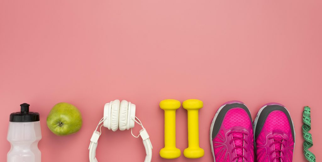 top-view-sneakers-with-weights-headphones